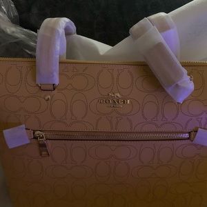 Coach bag authentic tags still on never used